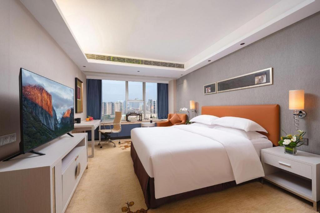 Leisure Hotel Дунгуань Экстерьер фото