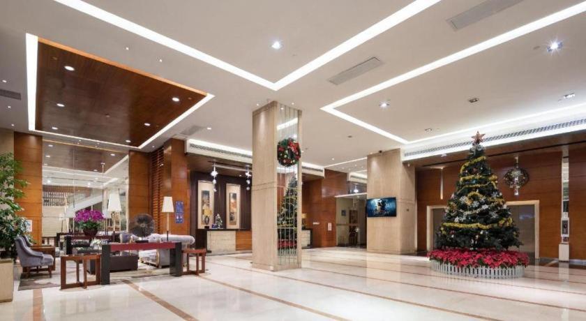 Leisure Hotel Дунгуань Экстерьер фото