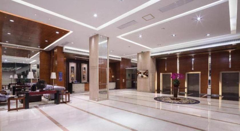 Leisure Hotel Дунгуань Экстерьер фото