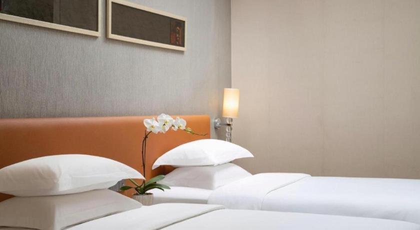 Leisure Hotel Дунгуань Экстерьер фото