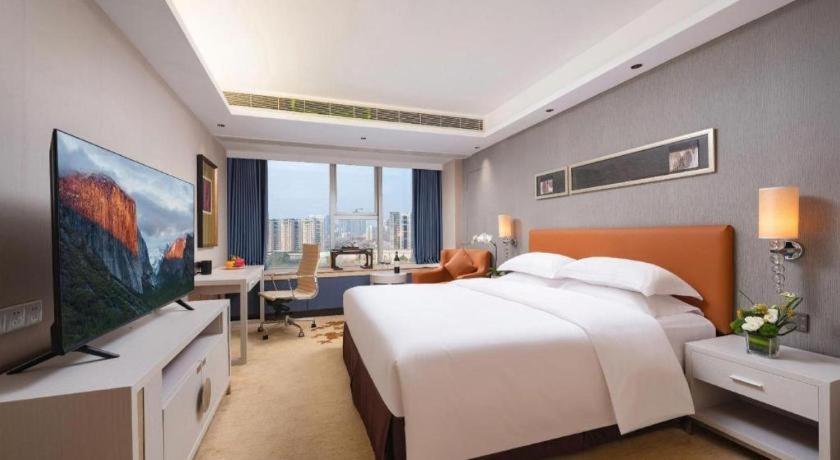 Leisure Hotel Дунгуань Экстерьер фото