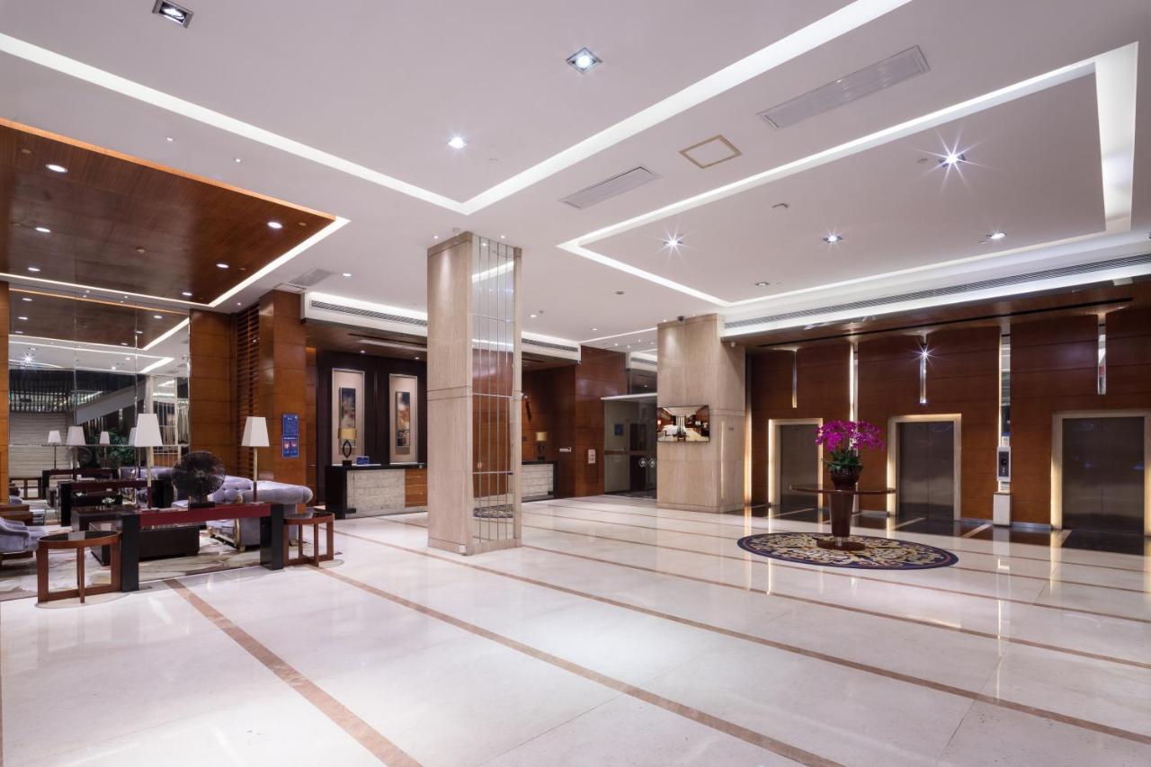 Leisure Hotel Дунгуань Экстерьер фото